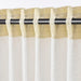 Close-up of beige IKEA ÅKERMOLKE curtains hanging in a living room-20566568