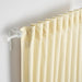 Modern beige IKEA ÅKERMOLKE curtains, 1 pair, 145x250 cm, in a well-lit room-20566568