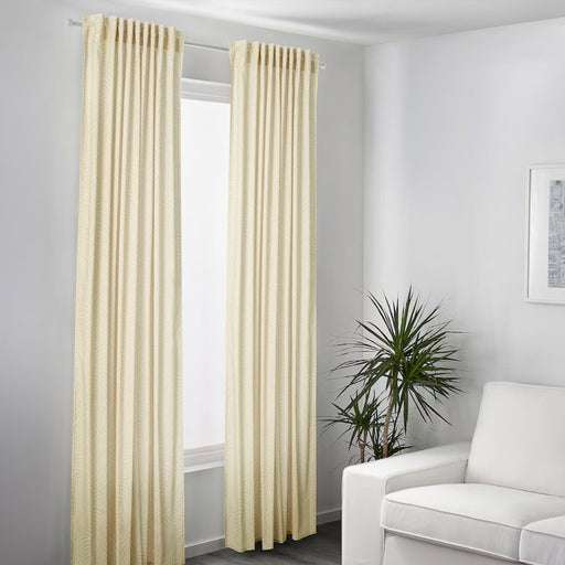 IKEA ÅKERMOLKE beige curtains, 1 pair, elegantly draped in a bedroom-20566568