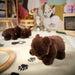 IKEA ALPTALL black bear cub soft toy 27cm from a different angle showing soft plush fabric