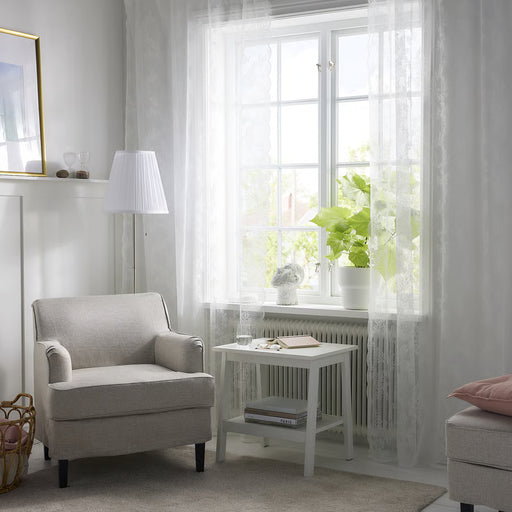 IKEA ALVINE SPETS white net curtains being hung on a white curtain rod, installation video preview