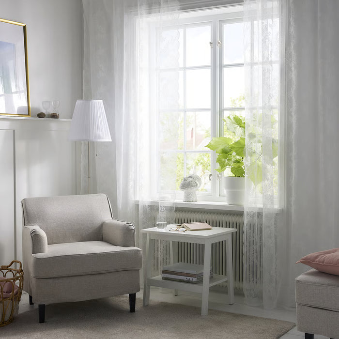 IKEA ALVINE SPETS white net curtains being hung on a white curtain rod, installation video preview