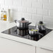 IKEA ANNONS saucepan and pot set with tempered glass lids stacked together