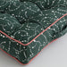 A rectangular GREEN floor cushion from IKEA, perfect for a kid's playroom.-80568772