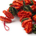 IKEA AROMATISK colourful dried flower garland hanging on white door festive indoor décor