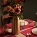 IKEA AROMATISK gold vase on festive dining table with colourful flowers