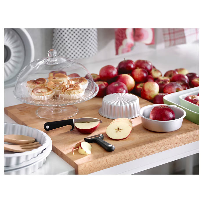 IKEA ARV BRÖLLOP serving stand with lid on a kitchen counter, with the lid removed beside it