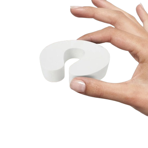 Anti-collision door clip installed on a wooden door to prevent slamming