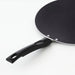 IKEA BÄCKBRÄSMA flat pan close-up of black grip-friendly handle and non-stick surface