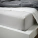  IKEA BÄRGLIM grey fitted sheet neatly folded showing 160x200cm size