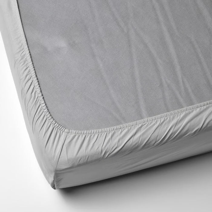  IKEA BÄRGLIM grey fitted sheet elastic corner stretched to show fit for mattresses up to 16cm
