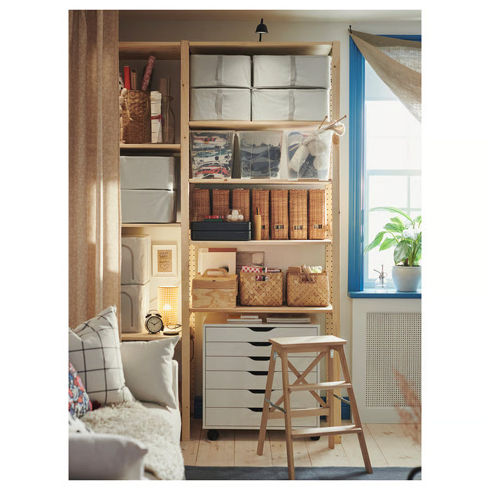  IKEA BEKVÄM beech step stool folded leaning against wall with wall hook visible