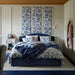 IKEA BITTERSÖTA duvet cover and pillowcase set styled on bed, blue bird design