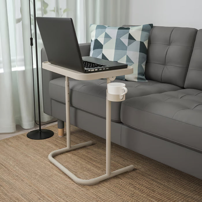 IKEA BJÖRKÅSEN laptop stand folded flat for easy storage in a small apartment space