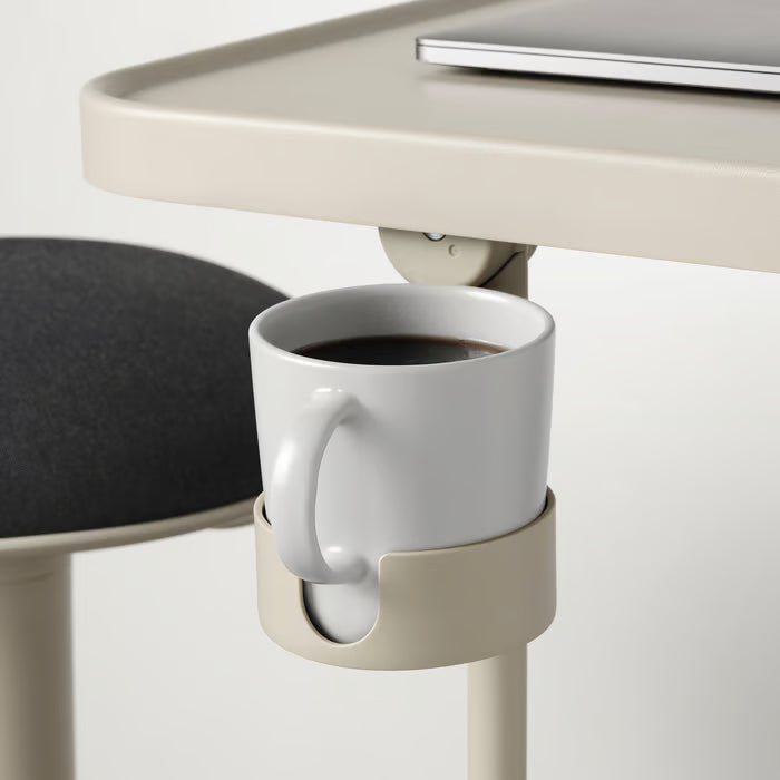 Close-up of the adjustment lever on the IKEA BJÖRKÅSEN beige laptop table for height control