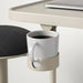 Close-up of the adjustment lever on the IKEA BJÖRKÅSEN beige laptop table for height control