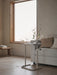 IKEA BJÖRKÅSEN beige stand showing the built-in cup holder clip and sturdy steel base