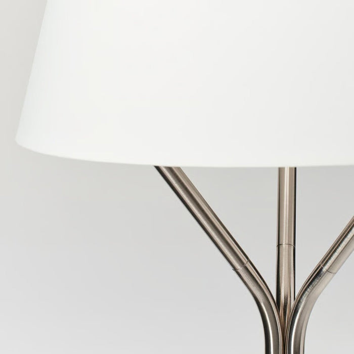 Elegant arched floor lamp in polished nickel with a soft white shade