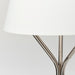 Elegant arched floor lamp in polished nickel with a soft white shade