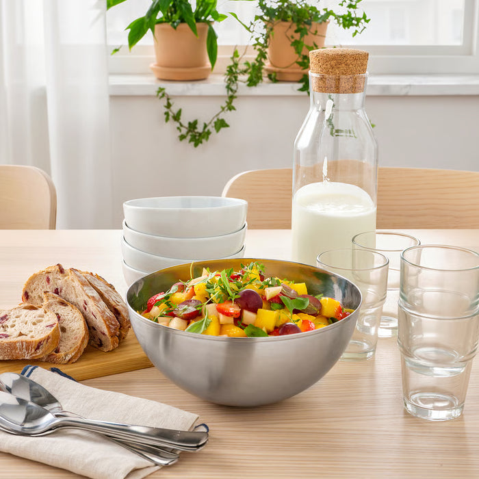 IKEA BLANDA BLANK bowl styled on wooden dining table with fruit salad bread and carafe
