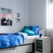 Kids bedroom styled with IKEA BLÅVINGAD bedding whale and turtle theme and octopus plush