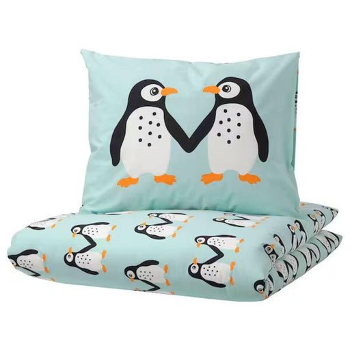 "IKEA BLÅVINGAD duvet cover and pillowcase with a playful penguin pattern on a light turquoise background. Dimensions: 150x200 cm (59x78 3/4 inches) for the duvet cover, 50x80 cm (20x31 inches) for the pillowcase-30521089