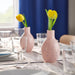 Delicate IKEA BLODBJÖRK vase in a soft pale pink and blue ombre effect, standing 16 cm (6¼") tall, perfect for displaying single stems or small floral arrangements in modern interiors.