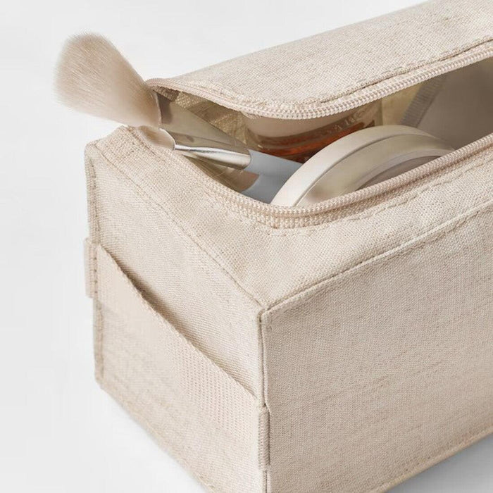 "Foldable toiletry bag for easy storage from IKEA"