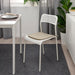 IKEA BRÄMÖN grey-beige chair pad on a wooden dining chair in a kitchen setting
