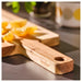 Close-up of IKEA BRÖGGAN acacia chopping board showing natural wood grain -90570703