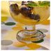 "Clear glass BRÖGGAN dessert bowl, a stylish addition to any dining setting."