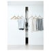 IKEA BUMERANG natural wood hangers in white wardrobe with blouse, sweater and striped skirt