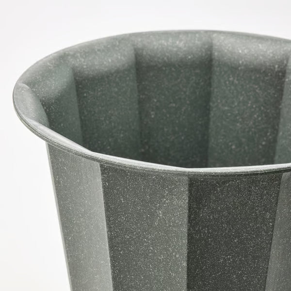 Close-up of IKEA BUSKVERK grey ribbed plant pot showing recycled material texture