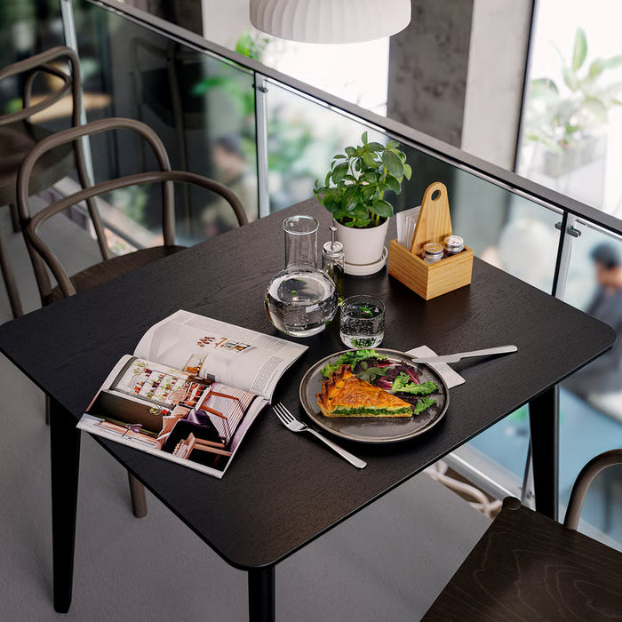  IKEA CHOKLADHAJ wood organiser styled on small dining table with plate glasses and plant by window