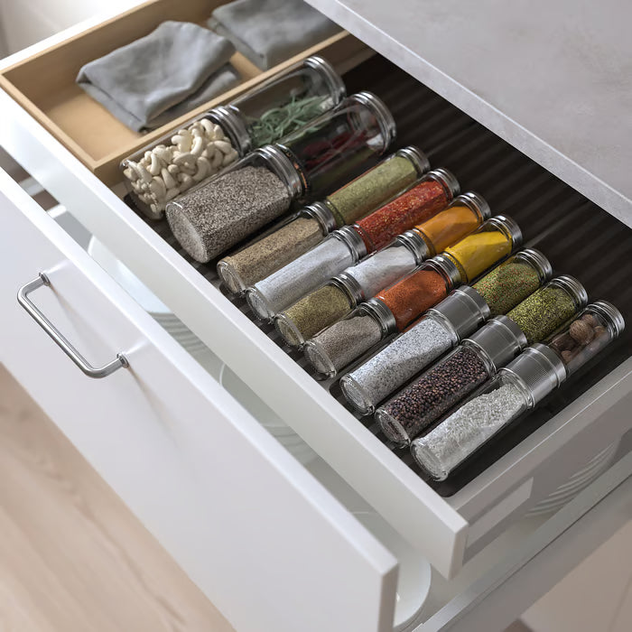  IKEA CITRONHAJ spice jars neatly organised in a row showing clear glass and metal lids