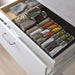  IKEA CITRONHAJ spice jars neatly organised in a row showing clear glass and metal lids