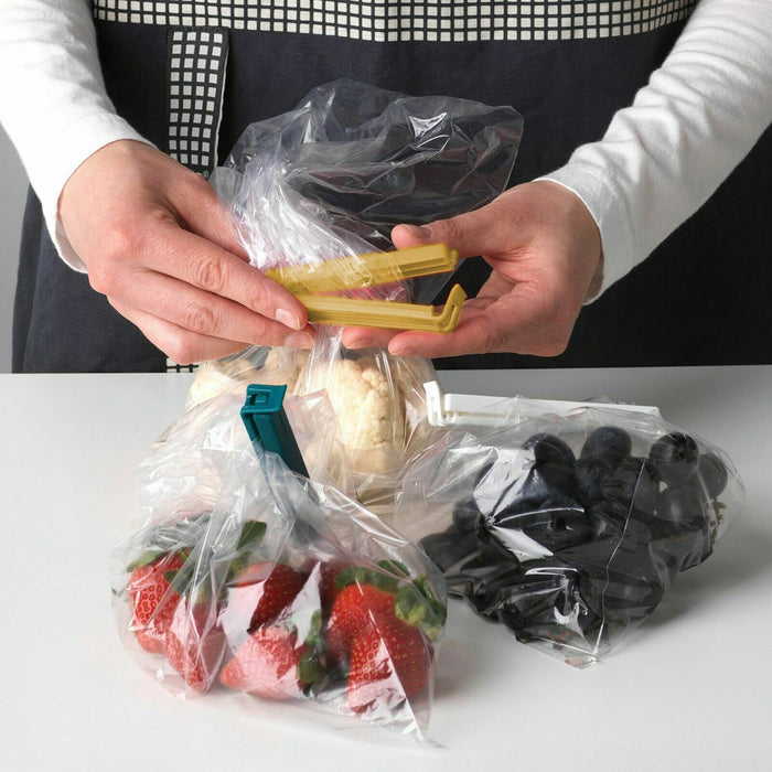 Secure and reusable clip for closing food packaging-50524181