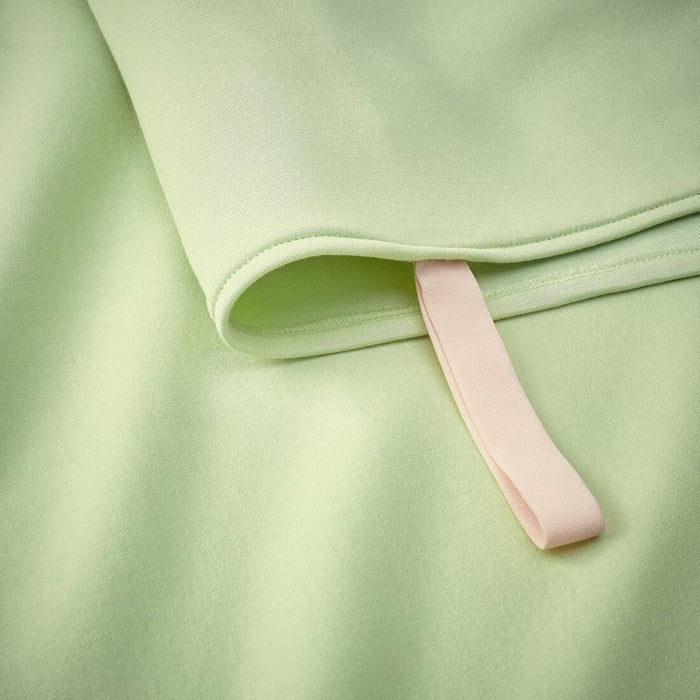 Close-up of Soft Fabric on IKEA DAJLIEN Light Green Blanket-00552732