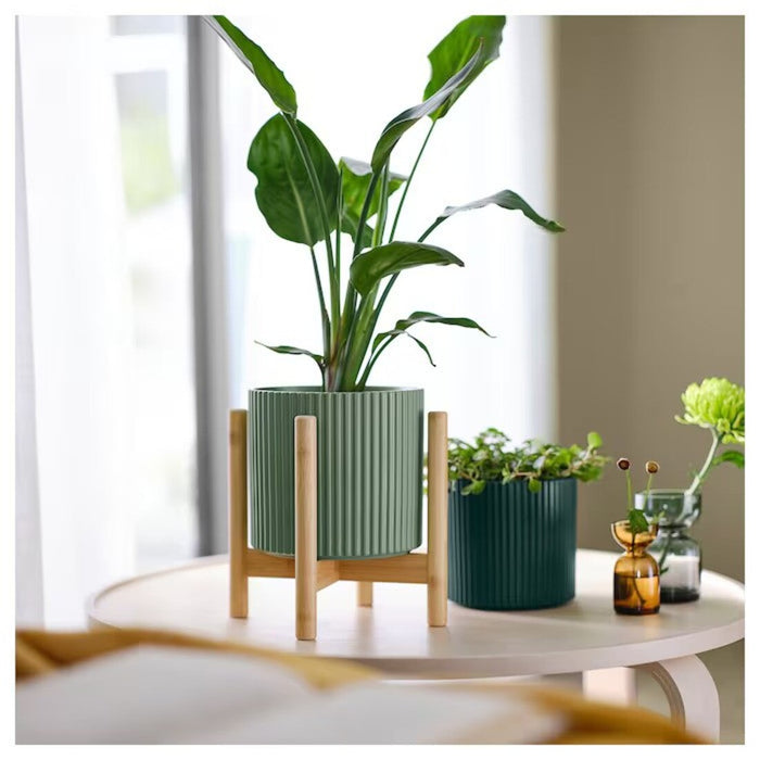 Bamboo plant stand adding a touch of nature to home decor