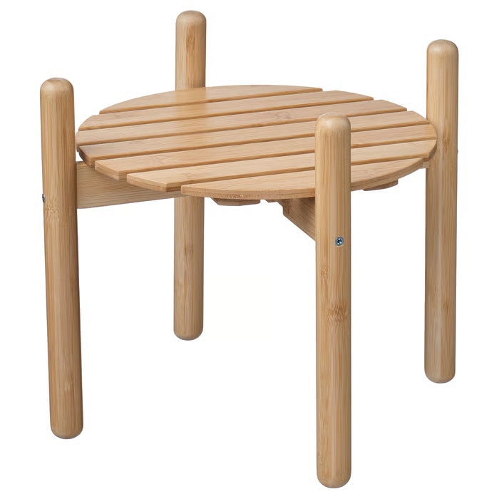 IKEA DAKSJUS bamboo plant stand 28cm with green potted plant in living room natural warm setting #20624356