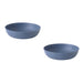 Two blue ceramic bowls on a white background