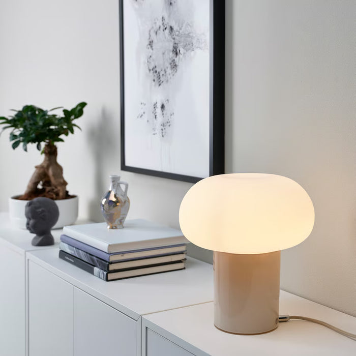 Serene bedroom with IKEA DEJSA chrome table lamp casting soft ambient light