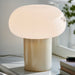 IKEA DEJSA table lamp close view showing rounded opal glass shade
