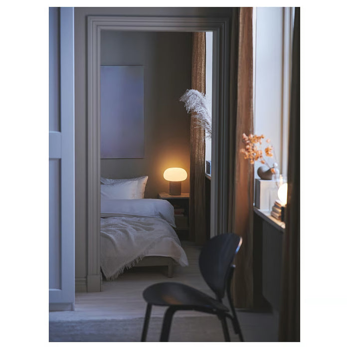 IKEA DEJSA lamp curved opal glass shade with chrome detailing close-up