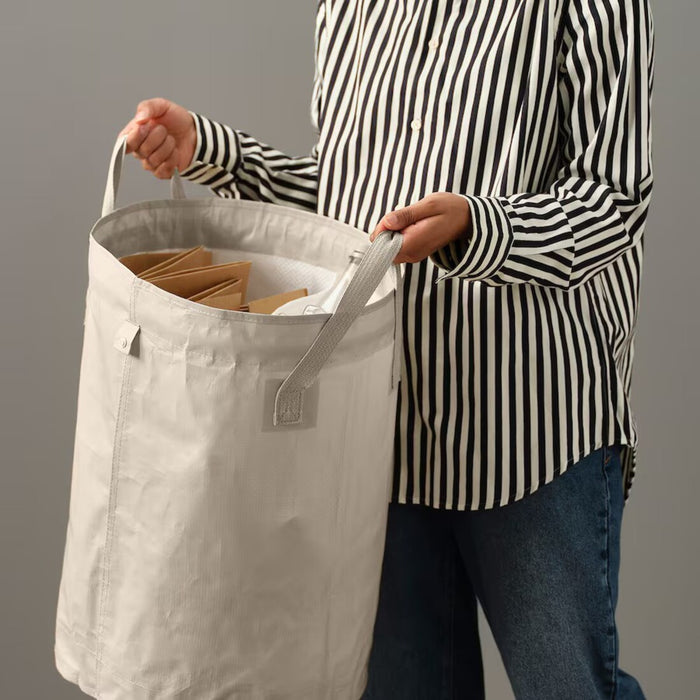 DIMPA 50-liter sorting bag with lid, light grey-beige, ideal for storing clothes, toys, or seasonal items.