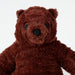 Close-up of IKEA DJUNGELSKOG bear cub showing embroidered safe eyes and soft snout detail