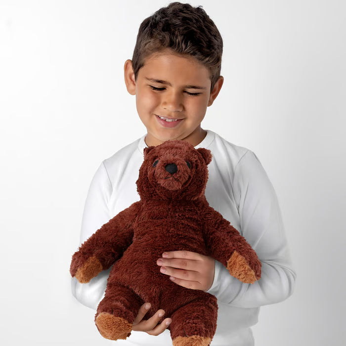 IKEA DJUNGELSKOG small brown bear cub being held to show 32cm scale for kids and travel