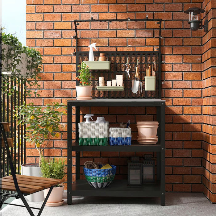 White and green DJURTRÄNARE storage basket placed on a wooden shelf, blending with modern home decor.

