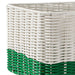 DJURTRÄNARE basket filled with books and accessories, demonstrating its versatile storage capacity.

