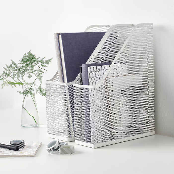 IKEA DRÖNJÖNS white mesh magazine holder showing cut-out handle for easy shelf access